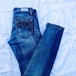 Buckle Skinny Jeans